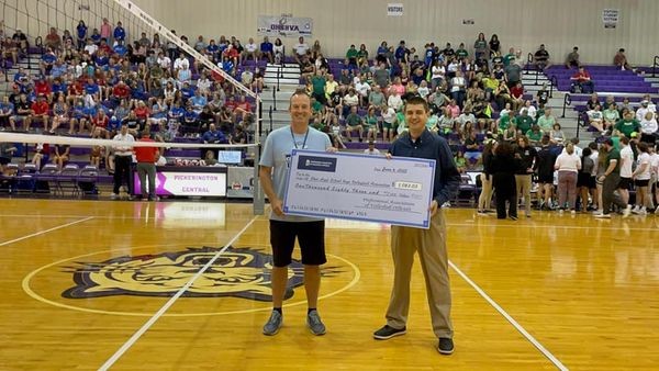 Representing_PAVO_-_Lucas_Tuggle_presents_check_to_OHSBVA_Executive_Director_Matt_Mihelic.jpg